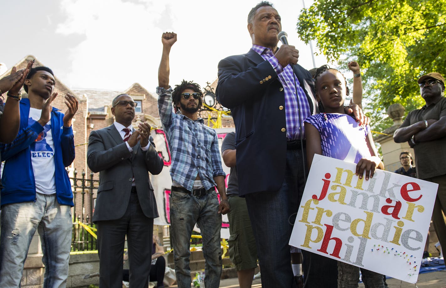 Jesse Jackson stood with Zenayzia Crite, 8, as he spoke to the crowd outside the governor's mansion in St. Paul on Friday. ] Isaac Hale &#xef; isaac.hale@startribune.com Jesse Jackson surprised the crowd gathered outside the governor's mansion in St. Paul and spoke to them in the late afternoon on Friday, July 8, 2016.