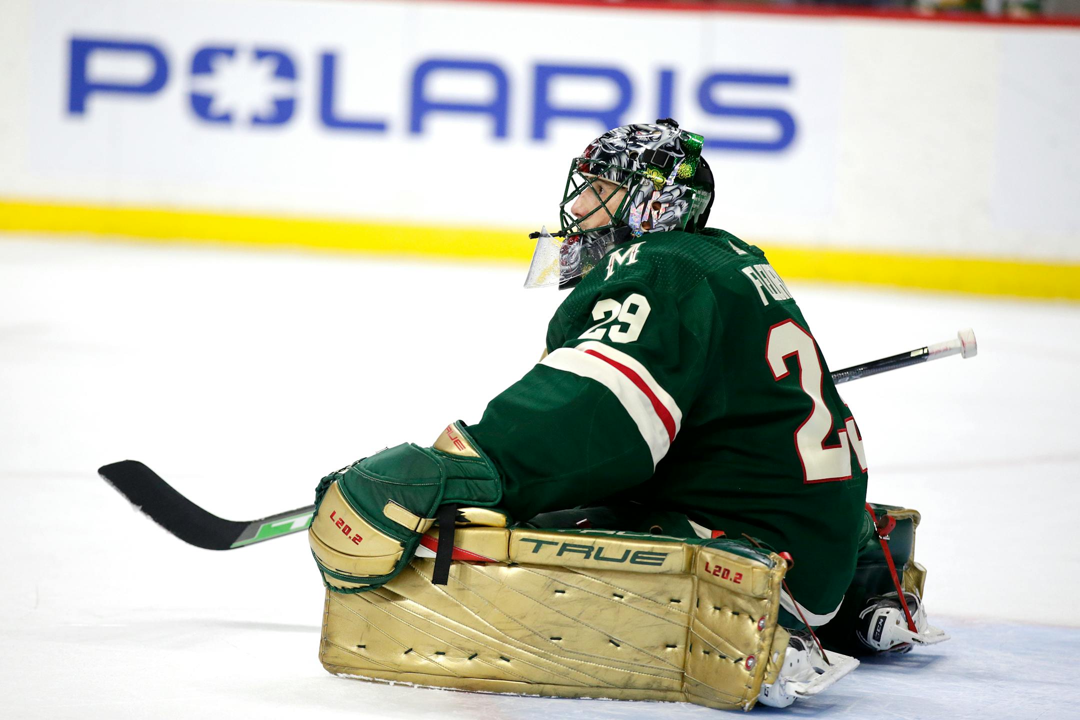 Minnesota Wild goaltender Marc-Andre Fleury stretches during an NHL hockey game against the Arizona Coyotes Saturday, Jan. 14, 2023, in St. Paul, Minn. (AP Photo/Andy Clayton-King)e
