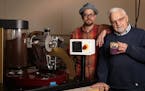 George Gorbatenko, right, creator of a machine for coffee houses to turn their beans into pods that can be used in Keurig coffeemakers and similar dev