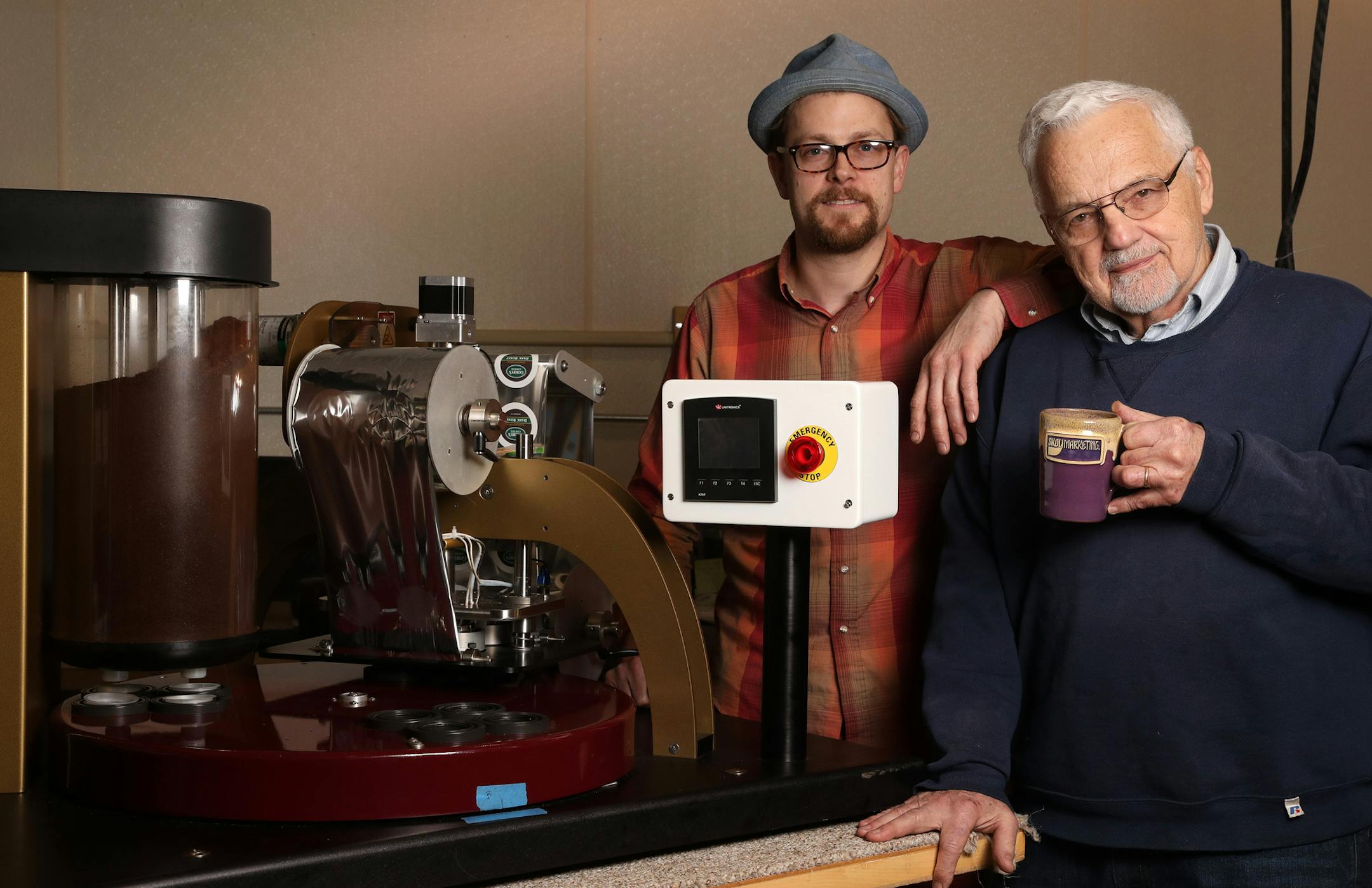 George Gorbatenko, right, creator of a machine for coffee houses to turn their beans into pods that can be used in Keurig coffeemakers and similar devices, pictured, and his business partner Peter Middlecamp, roastmaster at Black Sheep Coffee Cafe, stood for a portrait Thursday. ] ANTHONY SOUFFLE &#xef; anthony.souffle@startribune.com George Gorbatenko, creator of a machine for coffee houses to turn their beans into pods that can be used in Keurig coffeemakers and similar devices, and his busine