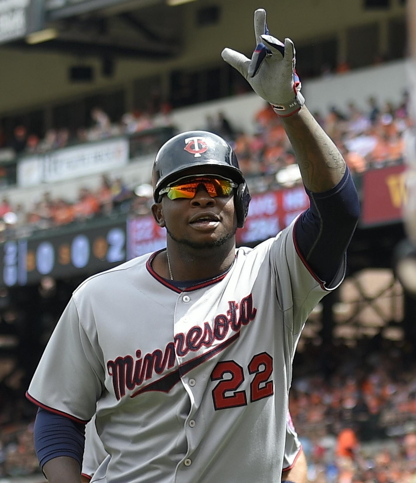 Minnesota Twins' Miguel Sano celebrates his two-run home run against the Baltimore Orioles during the first inning of a baseball game, Sunday, Aug. 23, 2015, in Baltimore. (AP Photo/Nick Wass)