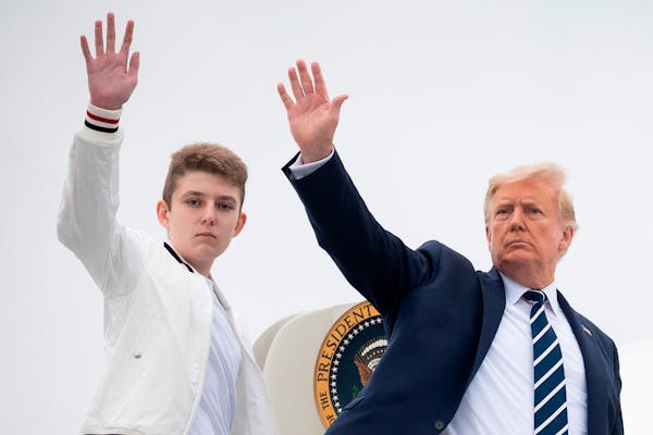 President Donald Trump and his son Barron waved as they boarded Air Force One in Morristown, N.J., in 2020.