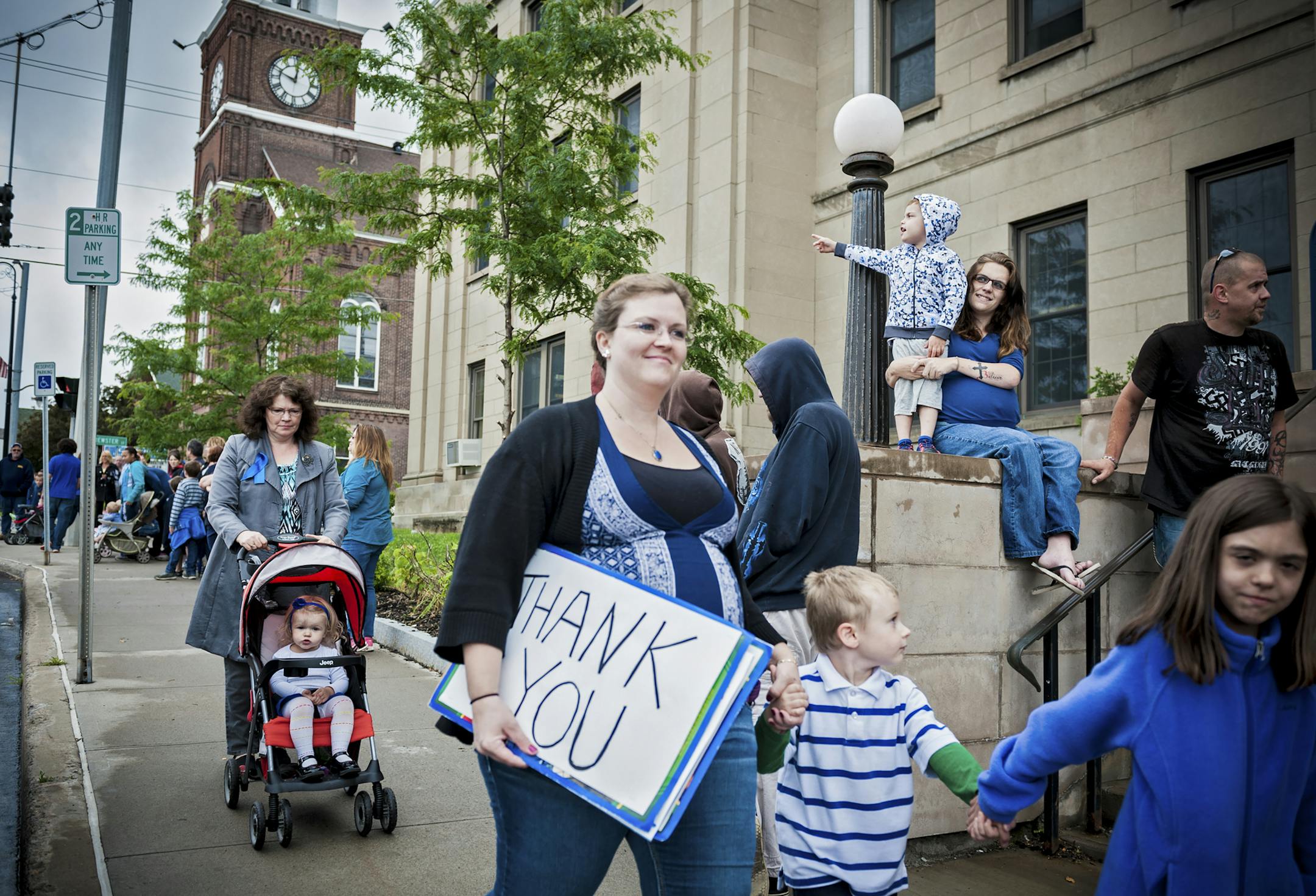People arrive at a rally in support of law enforcement officers following the search for two escaped convicted murderers in Malone, N.Y., June 29, 2015. Richard Matt was killed by a federal agent Friday and the other escapee, David Sweat, is hospitalized for gunshot wounds sustained during his capture Sunday. (Ian Thomas Jansen-Lonnquist/The New York Times)