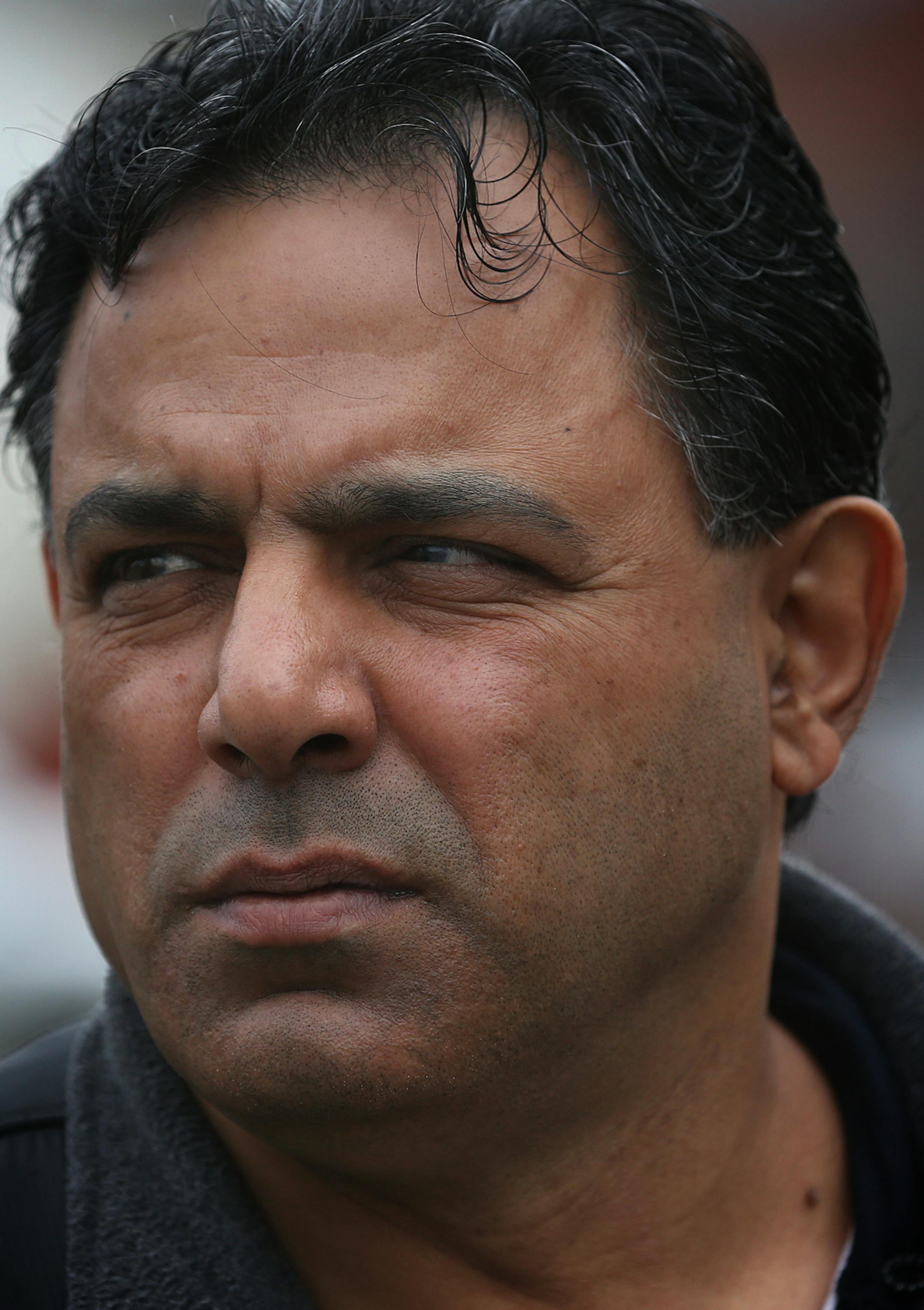 Nader Abuammo looked over the heavy damage caused to his store, Brix Grocery, in the 900 block of West Broadway. Apartments on the upper floors of the building were destroyed. ] JIM GEHRZ ï james.gehrz@startribune.com / Minneapolis, MN / April 24, 2015 /12:00 PM - BACKGROUND INFORMATION: The future of a historic north Minneapolis commercial strip is uncertain more than a week after a blaze ripped through its brick walls. The city said Thursday it won't demolish the properties, leaving build