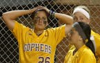 Gophers infielder Kaitlyn Richardson (26) and teammates reacted after their season finally ended.