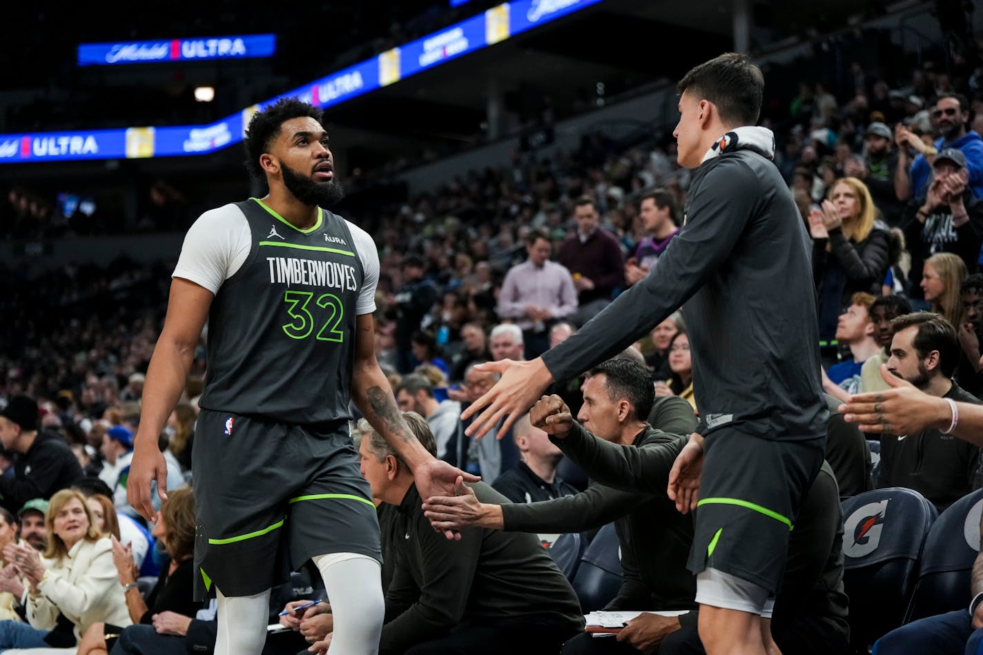 Minnesota Timberwolves center Karl-Anthony Towns (32) takes a break on the bench in the second half. Towns set a personal and franchise record with 62 points. The Minnesota Timberwolves lost to the the Charlotte Hornets 128-125 at the Target Center on Monday, Jan. 22, 2024 in Mankato, Minn.  ] RENEE JONES SCHNEIDER • renee.jones@startribune.com