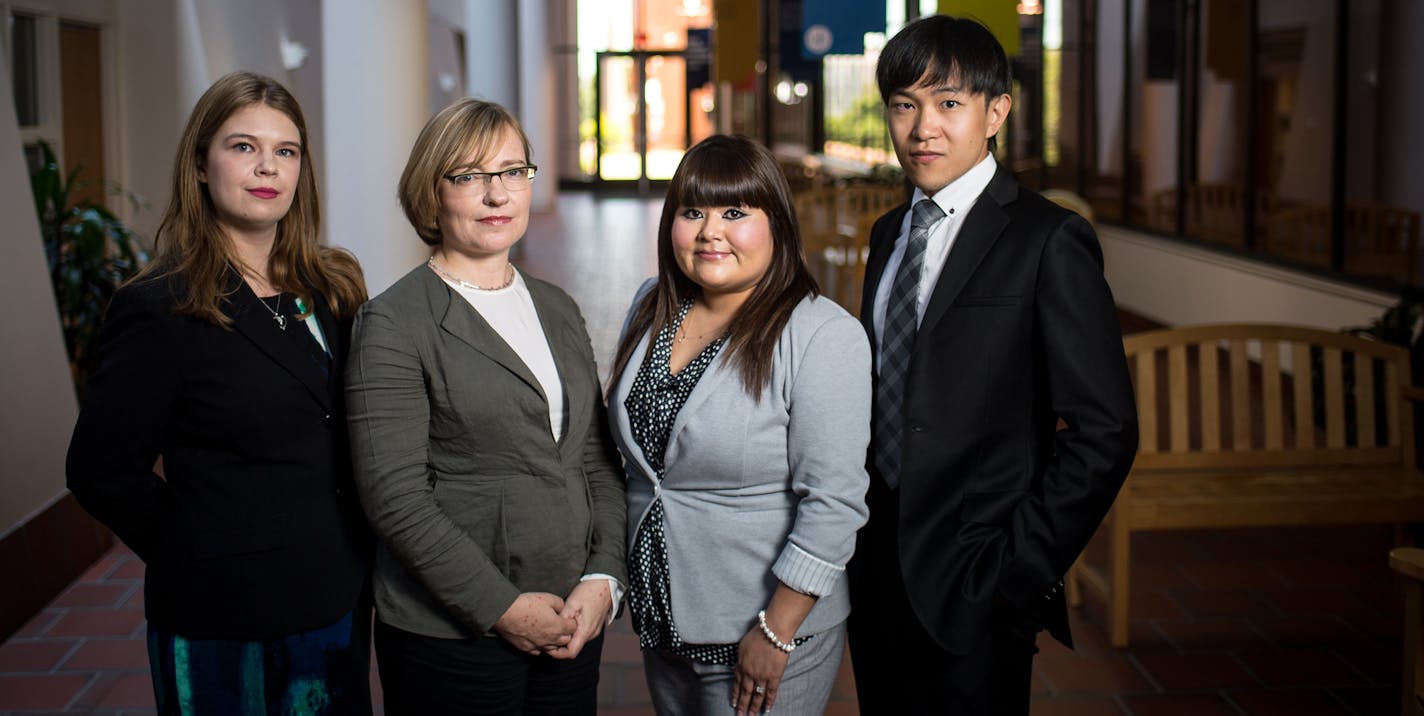 Professor JaneAnne Murray, left of center, was photographed with students, from left, Lindsey Lancette (cq), Stacy Kalpathy (cq) and Shuang Xu (cq) Friday afternoon. ] (AARON LAVINSKY/STAR TRIBUNE) aaron.lavinsky@startribune.com When President Obama granted clemency to 42 federal prison inmates in an extraordinary gesture this month, U of M law professor JaneAnne Murray got to deliver the good news to one of them - an Oklahoma mother sentenced to more than 20 years for carrying heroin on behalf