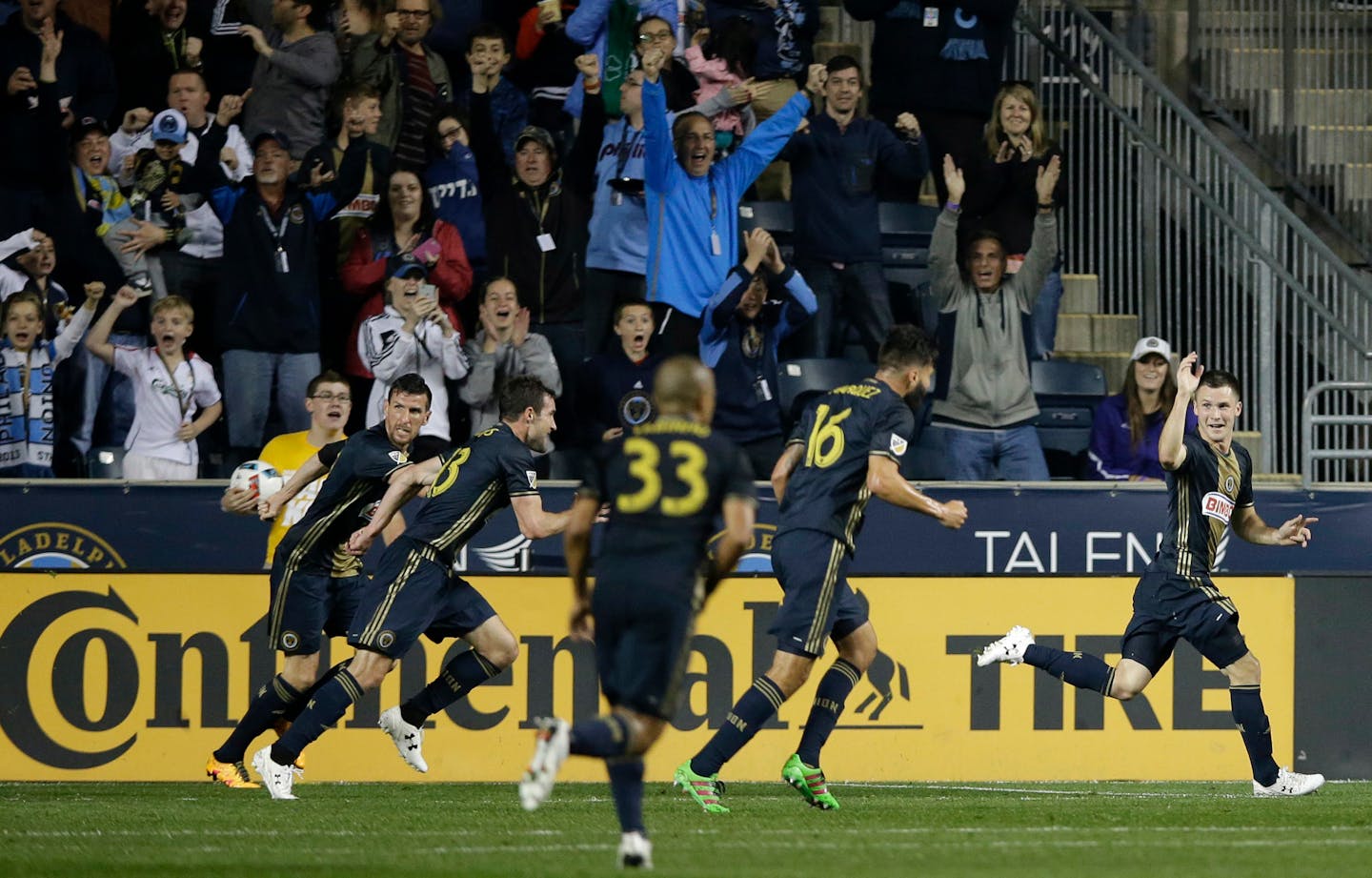 Philadelphia Union's Keegan Rosenberry, right, celebrates ahead of his teammates after scoring during the second half of an MLS soccer match against the Los Angeles Galaxy, Wednesday, May 11, 2016, in Chester, Pa. The game ended in a 2-2 draw. (AP Photo/Matt Slocum)