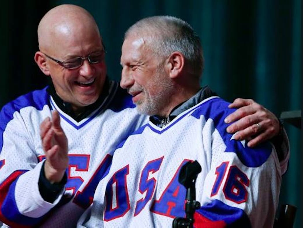 Jack O'Callahan, left, and Mark Pavelich of the 1980 U.S. ice hockey team talked during the 