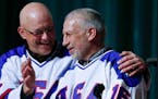 Jack O'Callahan, left, and Mark Pavelich of the 1980 U.S. ice hockey team talked during the "Relive the Miracle" reunion at Herb Brooks Arena on Satur