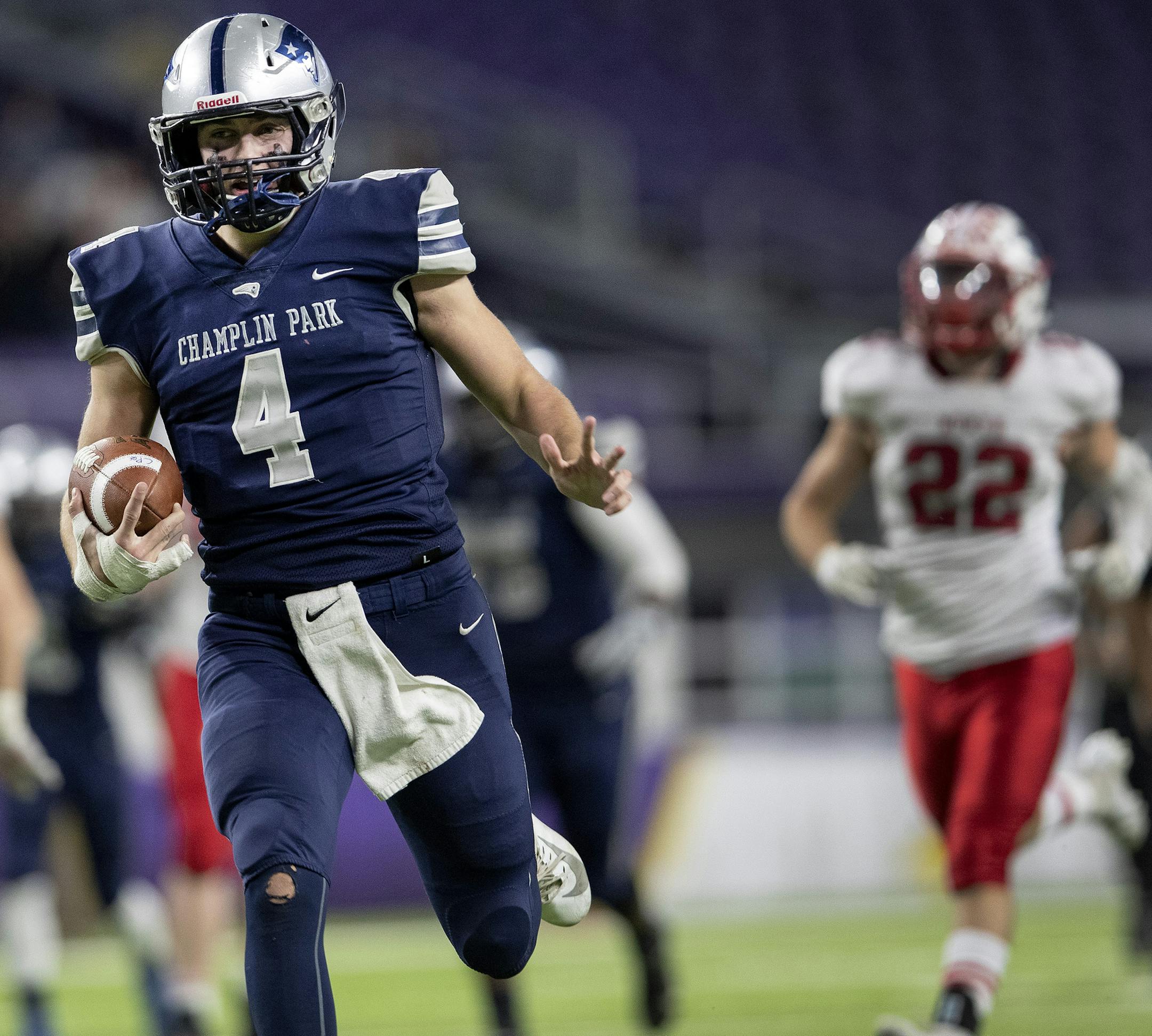 Champlin Park quarterback Jaice Miller (4) ran for a touchdown in the fourth quarter. ] CARLOS GONZALEZ &#x2022; cgonzalez@startribune.com &#x2013; Minneapolis, MN &#x2013; November 14, 2019, U.S. Bank Stadium, MSHSL Football, semifinal state tournament football games.
6A
Champlin Park vs. Lakeville North