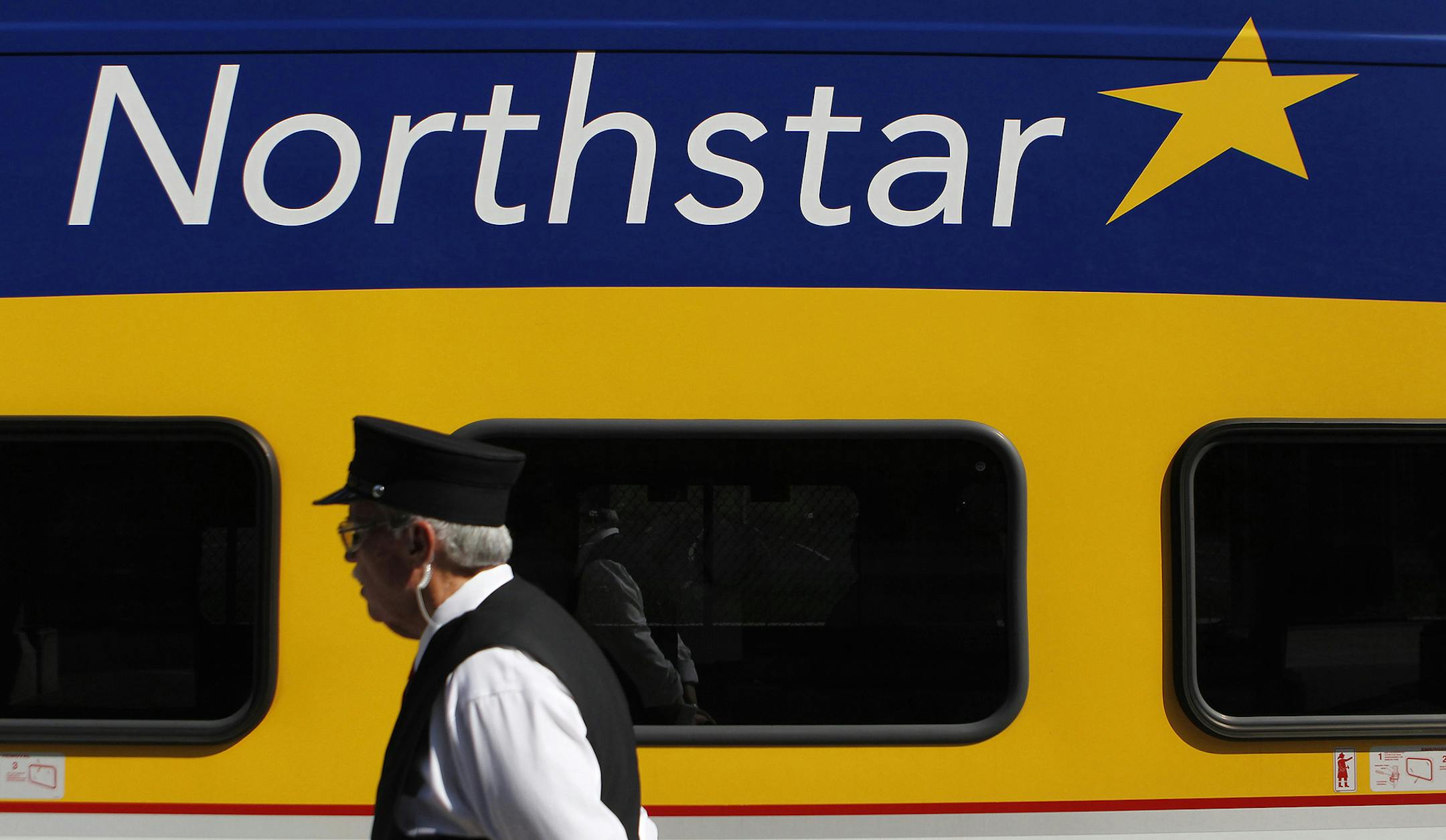Conductor J.R. Long waked by the Northstar Commuter Rail at Target Field on Tuesday. ] CARLOS GONZALEZ ï cgonzalez@startribune.com , July 19, 2011, Target Field, Minneapolis, Minn, MLB, Minnesota Twins vs. Cleveland Indians ORG XMIT: MIN2012101613212730 ORG XMIT: MIN1412181850220249 ORG XMIT: MIN1605051606120483