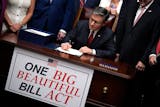House Speaker Mike Johnson, with Republican leaders, signs the "One Big Beautiful Bill Act" on Capitol Hill in Washington, D.C., on July 3, 2025.