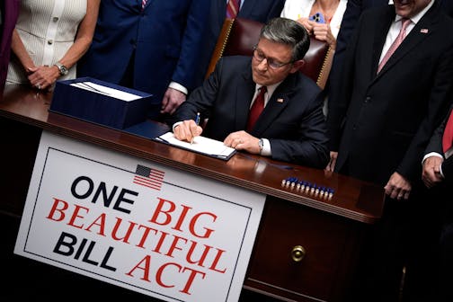 House Speaker Mike Johnson, with Republican leaders, signs the "One Big Beautiful Bill Act" on Capitol Hill in Washington, D.C., on July 3, 2025.