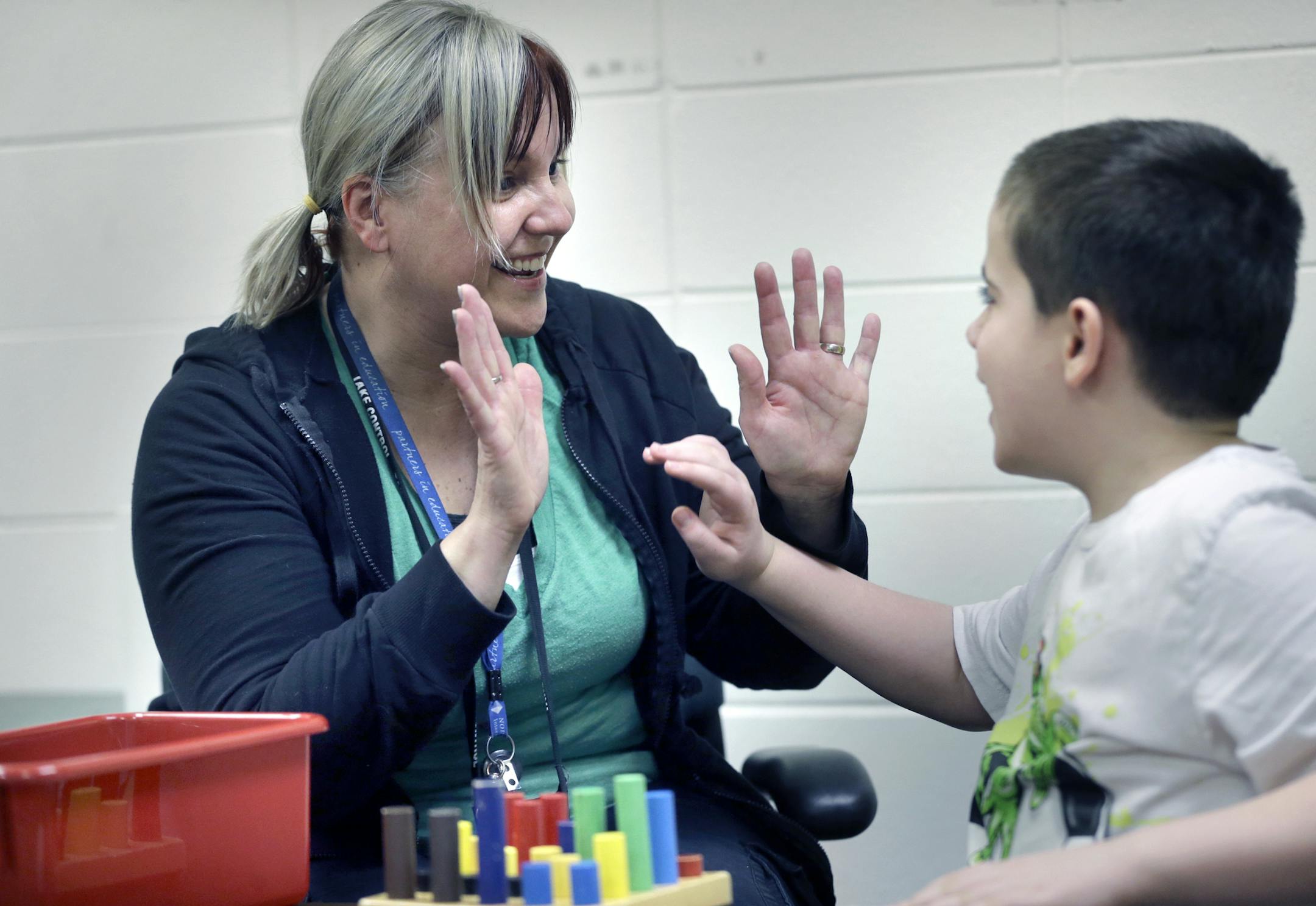 Heather Cronin Ott works with Jacob at the Otter Lake elementary school, She works with children who have autism and other learning disabilities [ STAR TRIBUNE/TOM WALLACE Assignments #20028294A March 28, 2013 EXTRA INFORMATION SLUG: mastery04xx13 EXTRA INFORMATION: last of warren wolfe's series of 'masters' Heather Cronin Ott She works at the Communications and Interactional Disorders (CID) Program, in Northeast Metro Intermediate School district 916 – set up to help students with autism