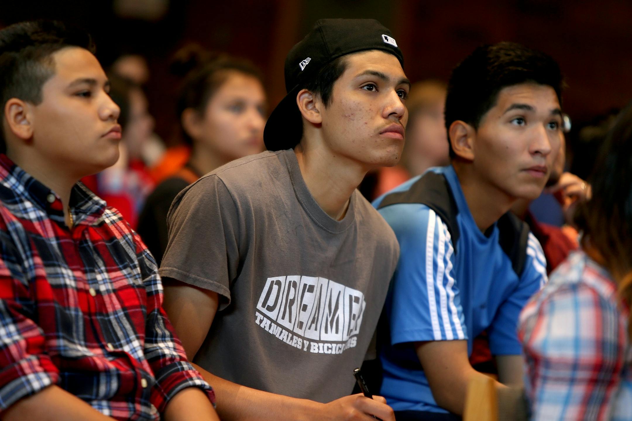 Protecting Dreamers is a "sound economic policy that acquires workers for the economy and makes an effort to address immigration problems," said Steve Billet, a former AT&T lobbyist. Above, students took notes on a Dream Act workshop at Augsburg College in 2013.