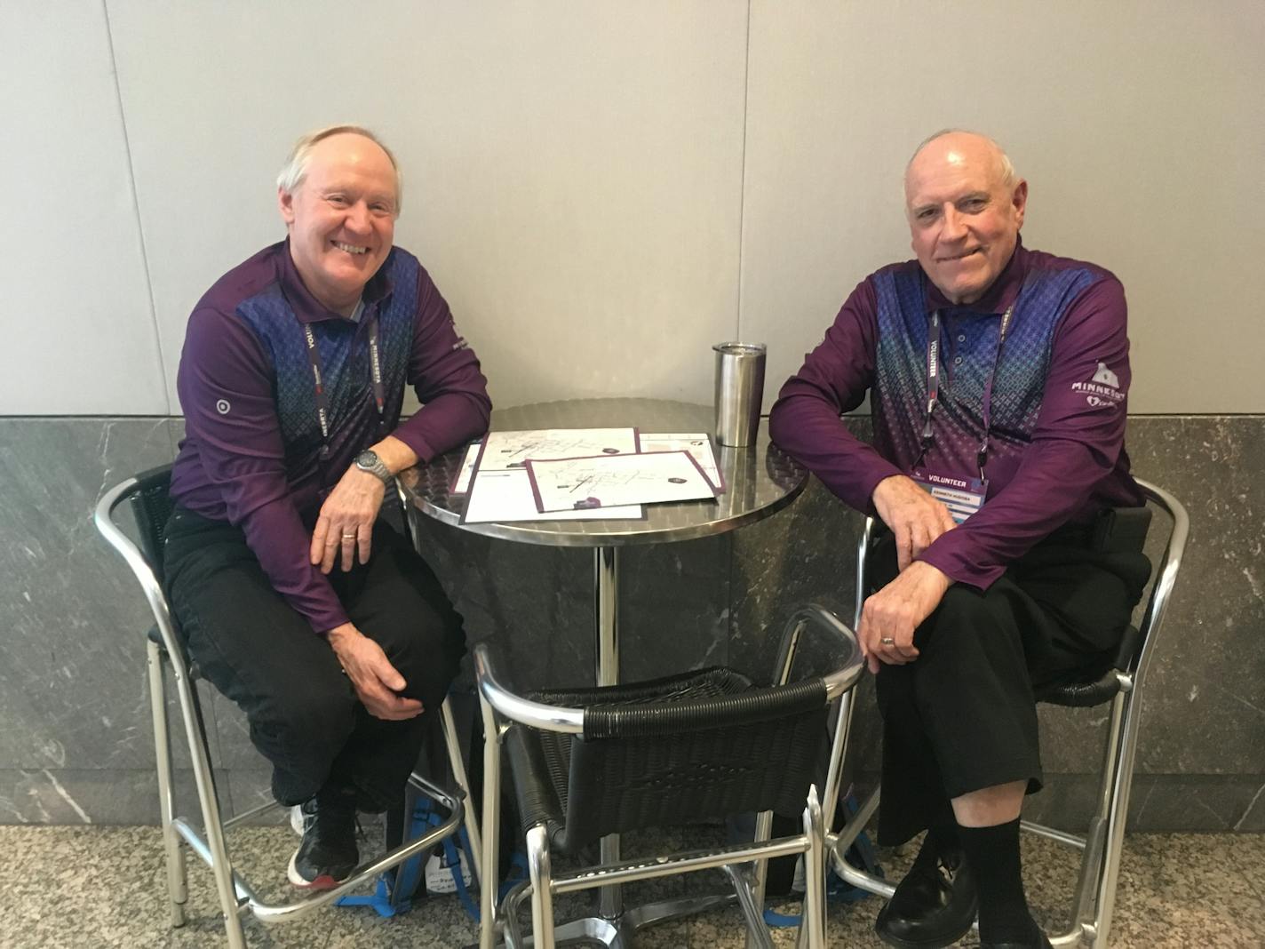 Two Super Bowl volunteers inside Minneapolis' skyway.