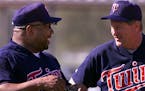 Twins great Kirby Puckett shares a laugh with coach Rick Stelmaszek during the first day of full squard spring training in Fort Myers.