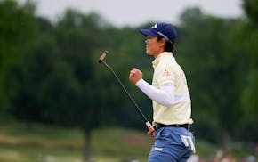 Yuka Saso of Japan reacts on the 18th green during the final round of the U.S. Women's Open at Lancaster Country Club on Sunday in Lancaster, Pa.