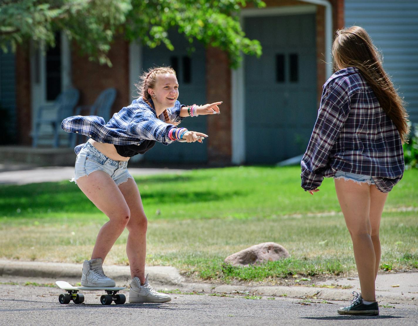 Chloe Bennett, 14 and her friend Haley Klun, 15, danced to the soundtrack coming from Chloe's phone. ] GLEN STUBBE * gstubbe@startribune.com Thursday, June 30, 2016 Chloe Bennett, 14 and her friend Haley Klun, 15 are hanging out at their usual time to explore the woods and take pictures near Chloe's home in Hopkins. Chloe, 14, waited too long to find a summer job so she said she's often bored. "It's hard to find stuff to do," she said. "The days are really long without school.". For parents of t