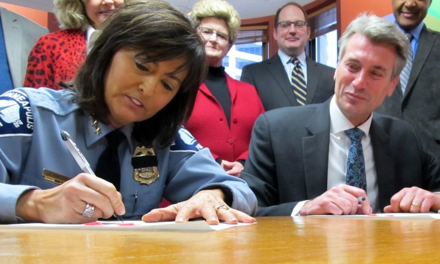 Police Chief Janee Harteau and Mayor R.T. Rybak