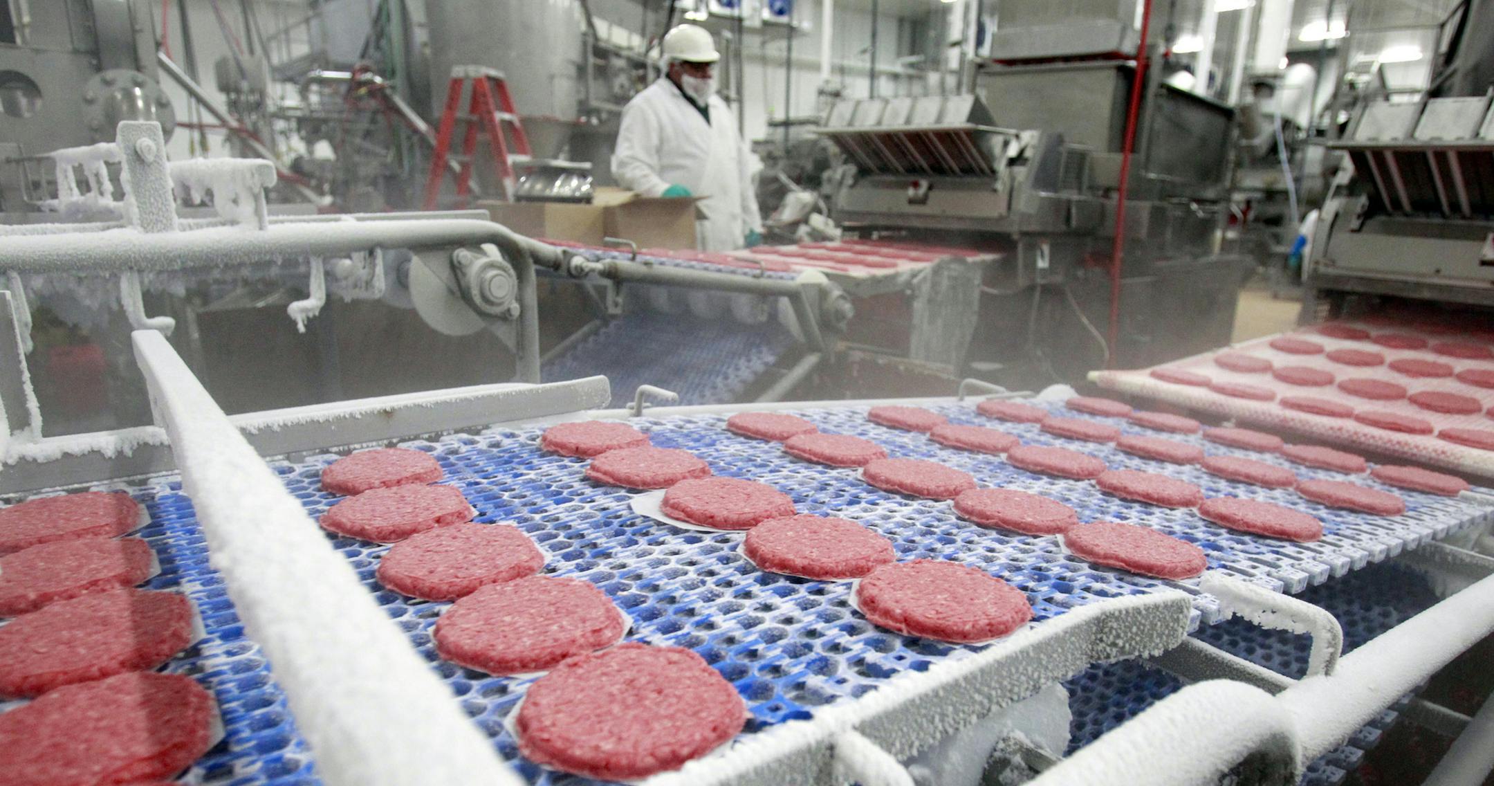 Costco produces hamburger for all their stores at a meat plant in Tracy, California. Hamburgers are flash frozen as they move through the plant. (Keith Myers/Kansas City Star/MCT) ORG XMIT: 1132168