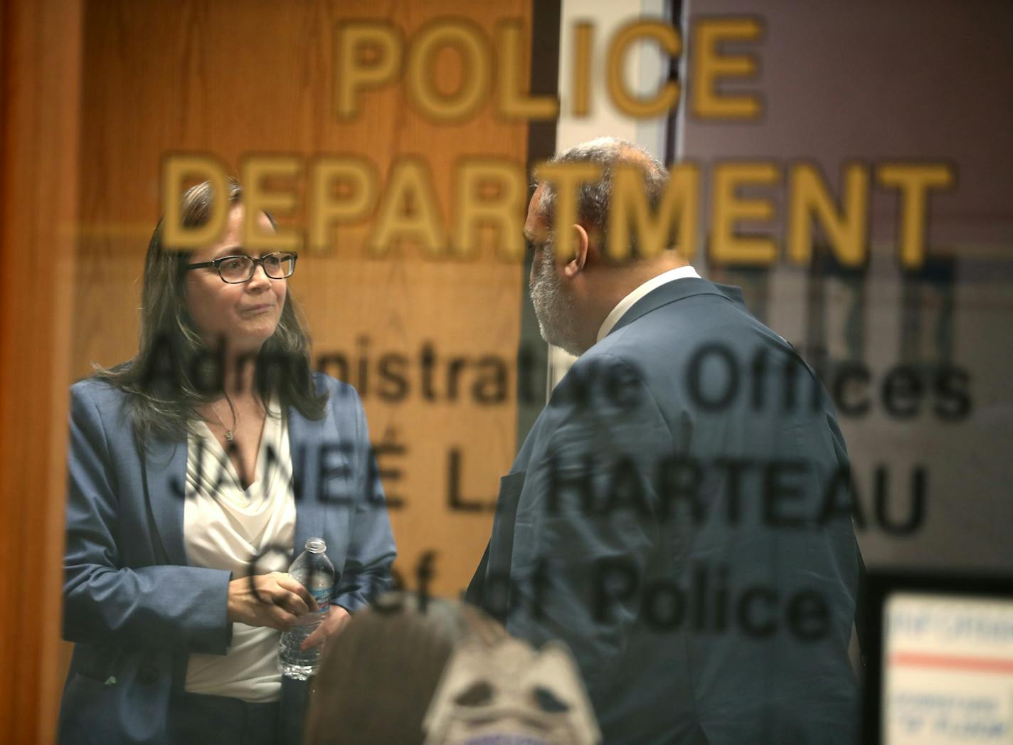 Caroline Durham, the attorney for Irma Burns, and Attorney Albert Goins talked after meeting with Minneapolis Police Chief Janee Harteau after she announced that they will not discipline the two officers in the Nov. 15, 2015 shooting death of Jamar Clark at the Minneapolis Police Department.