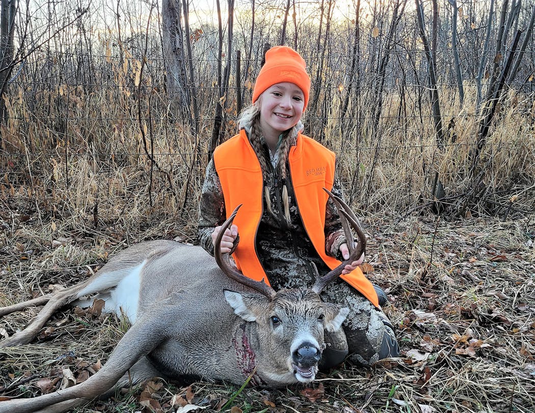 Emma Zelinski and her friend Tracy were perched on a 12-foot-high platform near a swamp on private land near Isle, Minn., when this buck rustled some vegetation and walked out at 6:45 a.m. Sunday (Nov. 6). As the deer walked slowly toward a fence, Emma lined up her compact Winchester rifle. This was her first deer hunt, but she’s been competing in 4-H shooting sports since third grade. The buck jumped the fence, then stopped. When it looked back, she fired once and dropped the deer where it stood, 60 yards away. She later told her mother it was one of the best experiences of her life.