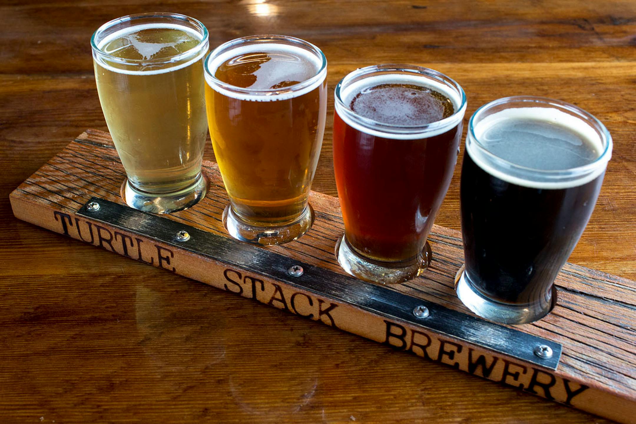 Turtle Stack Brewery serves a kolsch, summer ale, altbier, and black lager on a beer flight. ] COURTNEY PEDROZA • courtney.pedroza@startribune.com June 22-24, 2017; Wisconsin restaurants, cafes, bars, bakeries and breweries; Dining along the Mississippi River.