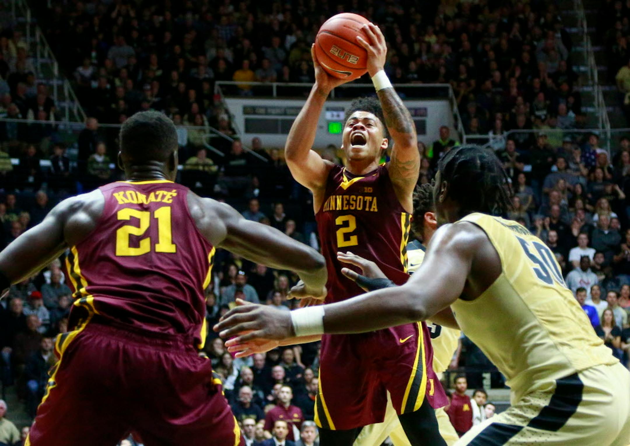 The Gophers’ Nate Mason kept hushing Purdue fans at Mackey Arena during a 91-82 upset with 31 points, 11 assists.