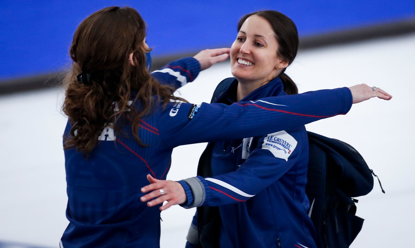 United States skip Tabitha Peterson, right, celebrates with a teammate after defeating Sweden in the bronze medal final at the women's world curling championship in Calgary, Alberta, Sunday, May 9, 2021. (Jeff McIntosh/The Canadian Press via AP)