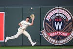 Matt Wallner catches a ball in right field while playing for the Twins against the Dodgers on April 9 at Target Field.