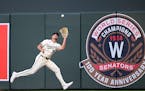 Minnesota Twins right fielder Matt Wallner (38) catches a sharp fly ball hit by Los Angeles Dodgers catcher Will Smith (16) in the top of the second i