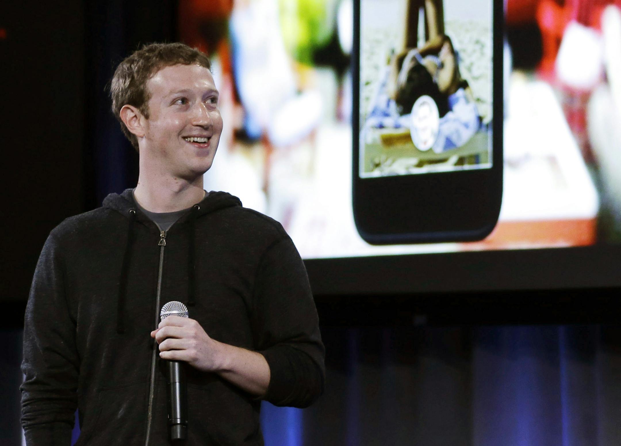 Facebook CEO Mark Zuckerberg speaks at the company's headquarters in Menlo Park, Calif., Thursday, April 4, 2013. Zuckerberg says the company is not building a phone or an operating system. Rather, Facebook is introducing a new social hub, called "Home," for Android phones.