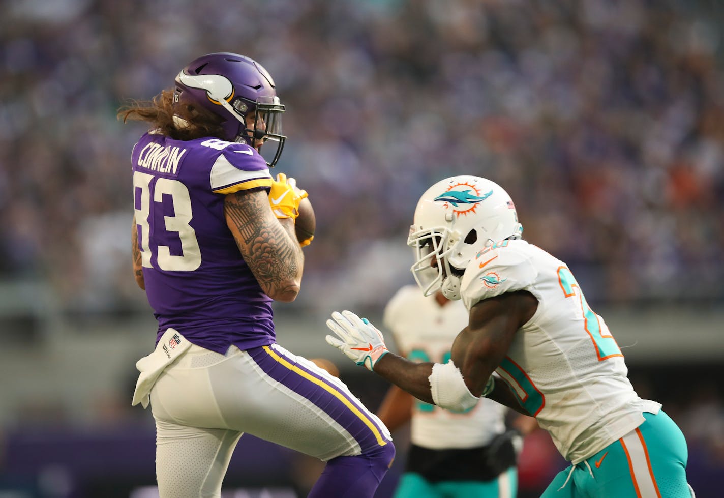 Vikings tight end Tyler Conklin braced for a hit from Dolphins free safety Reshad Jones, but not before picking up 20 yards and a first down on a third-and-1 call out of play-action.