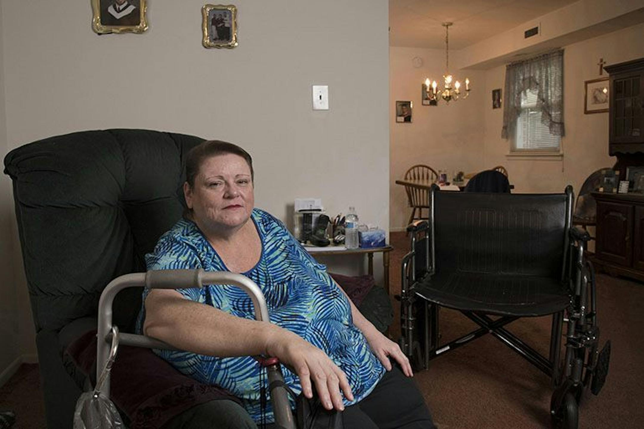 Carol Emanuele sits at home in Philadelphia. Emanuele was diagnosed with diabetes in 2015 and also survived stage 4 melanoma in her 30's.