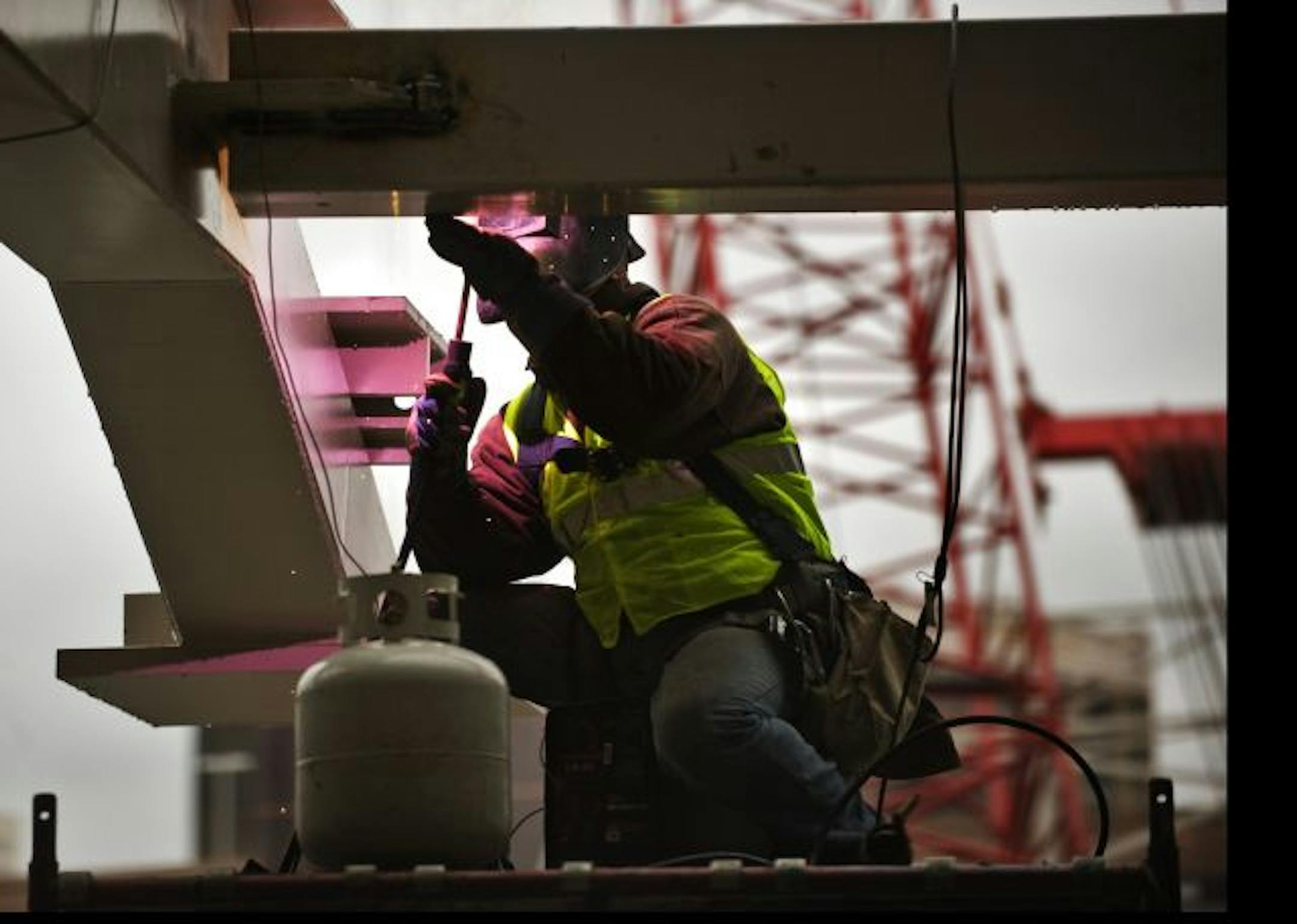A welder worked on the Twins' Target Field.
