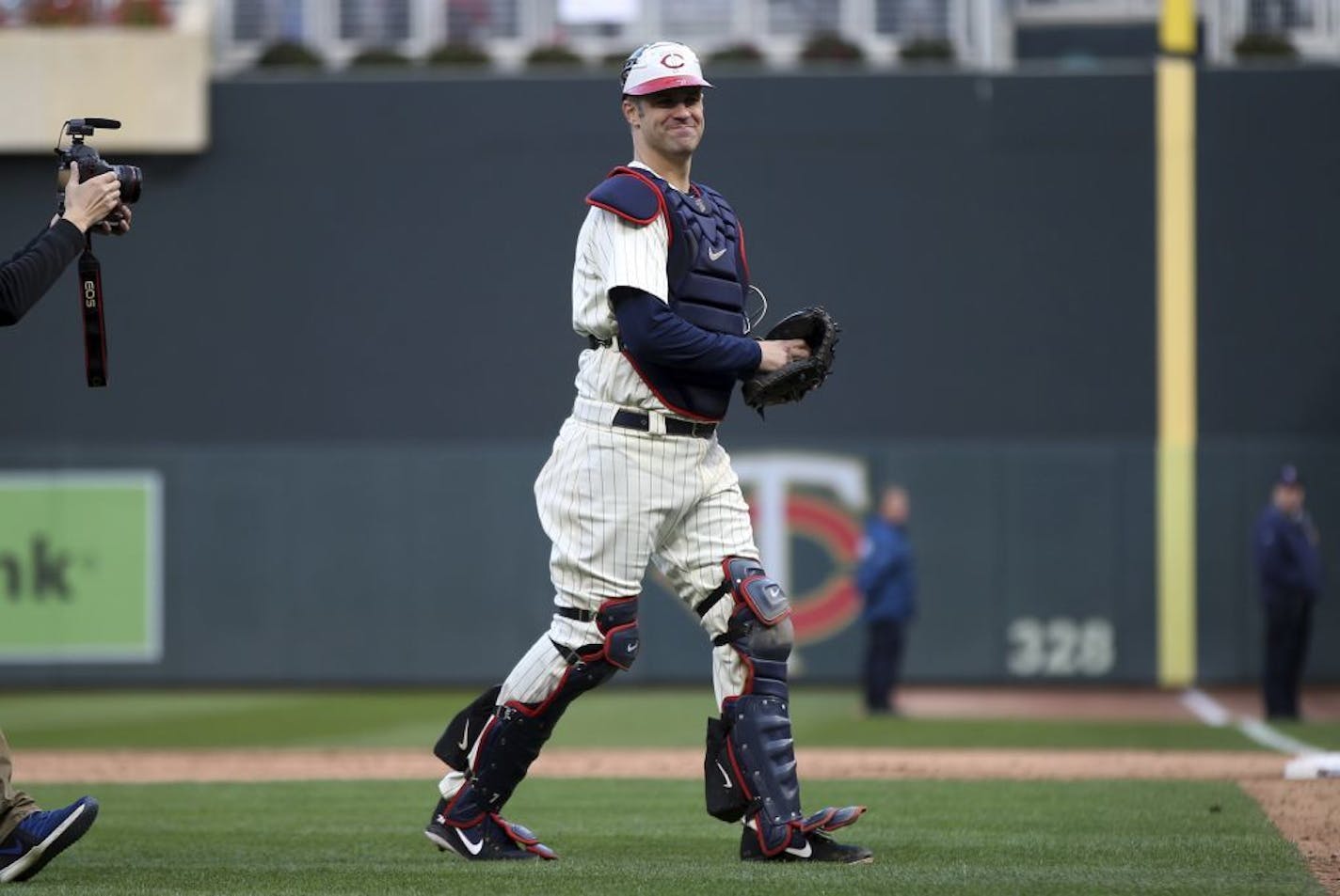 Joe Mauer caught one pitch at the start of the ninth inning on Sunday.