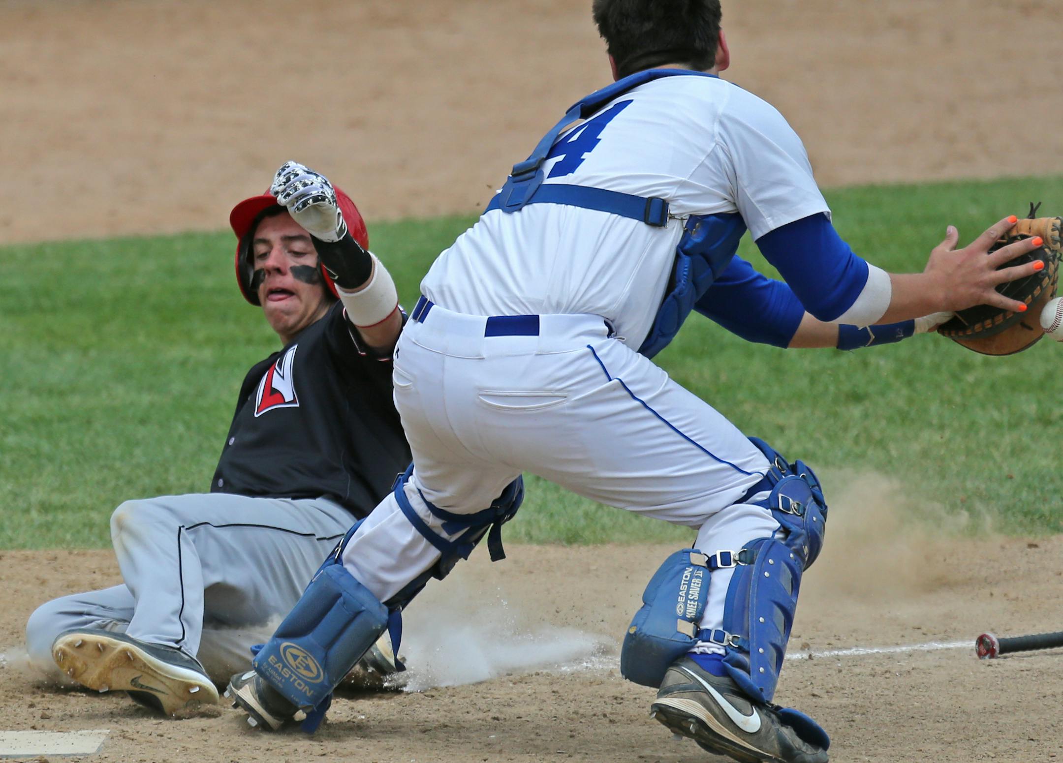 Lakeville North's Angelo Altavilla (sliding) is one of several talented shortstops headed for Division I colleges next year.