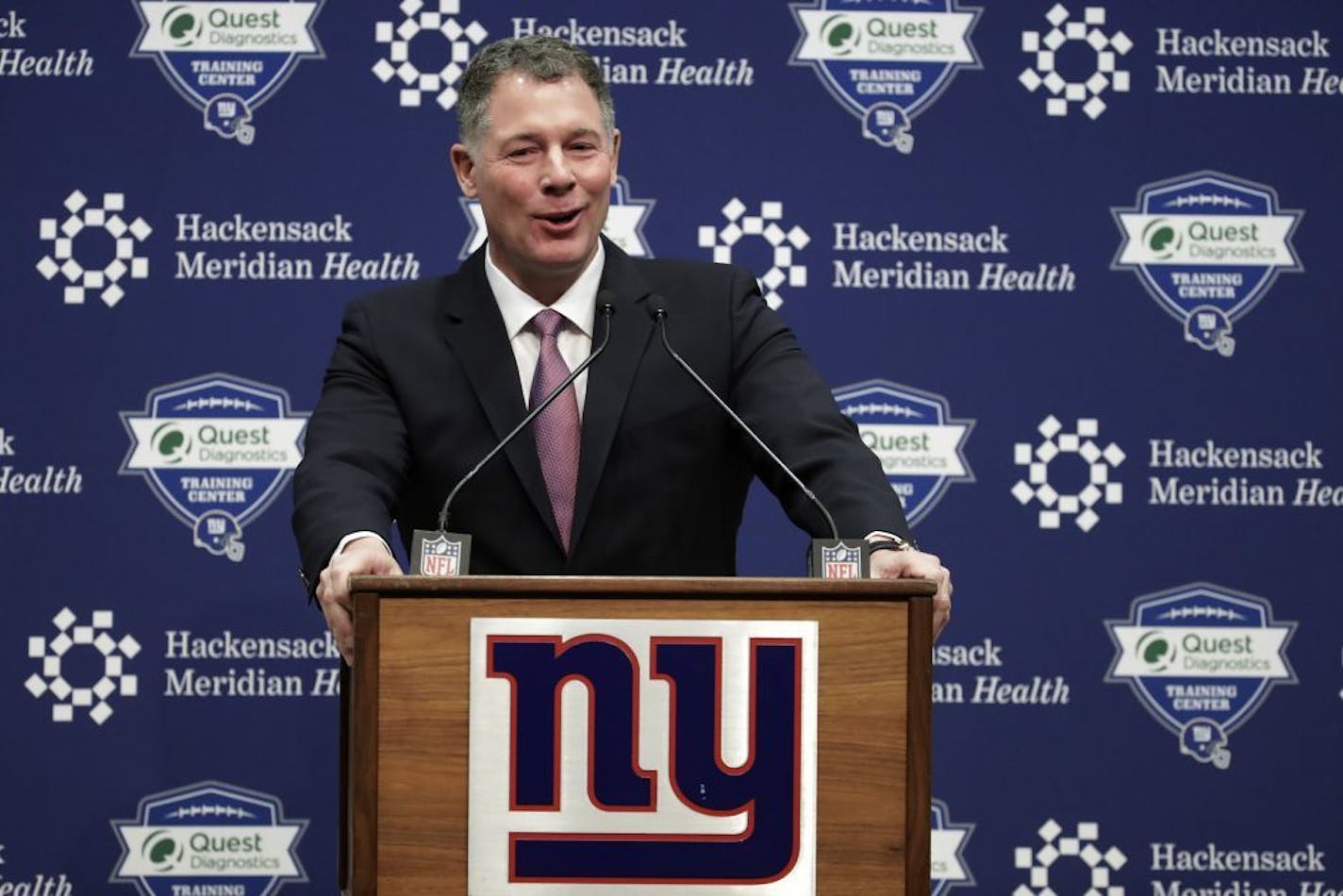 Pat Shurmur speaks after being introduced as head coach of the New York Giants during an NFL football news conference, Friday, Jan. 26, 2018, in East Rutherford , N.J. Shurmur, the former Minnesota Vikings offensive coordinator, was announced as the new coach less than 24 hours after he and the Vikings were beaten by the Philadelphia Eagles in the NFC title game. The 52-year-old Shurmur replaces Ben McAdoo, who was fired in early December.