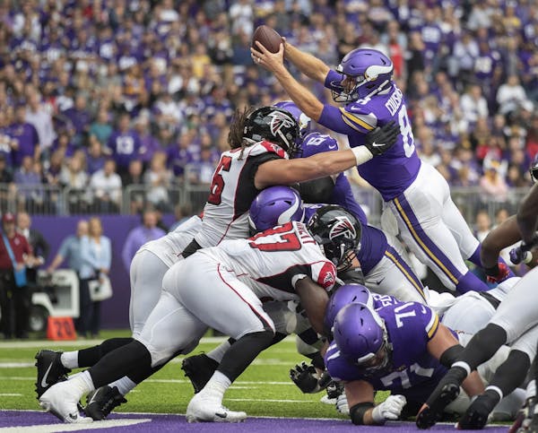 Minnesota Vikings quarterback Kirk Cousins (8) scored on a one yard sneak at U.S. Bank Stadium Sunday September 08,2019 in Minneapolis, MN.