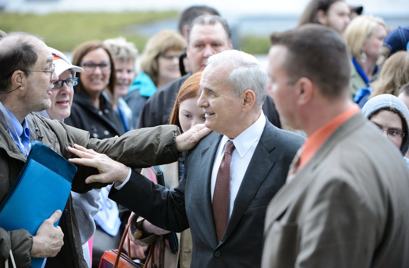 Ater releasing the budget, Governor Dayton met with members of ARRM, or Association of Residential Resources in Minnesota. ARRM members were at the Capitol to try to get an increase in spending for people with disabilities that can keep up with inflation. ] GLEN STUBBE * gstubbe@startribune.com Tuesday March 15, 2016 Gov. Mark Dayton, along with Lt. Governor Tina Smith and MMB Commissioner Myron Frans, released his spending priorities for the legislative session in his supplemental budget. ARRM