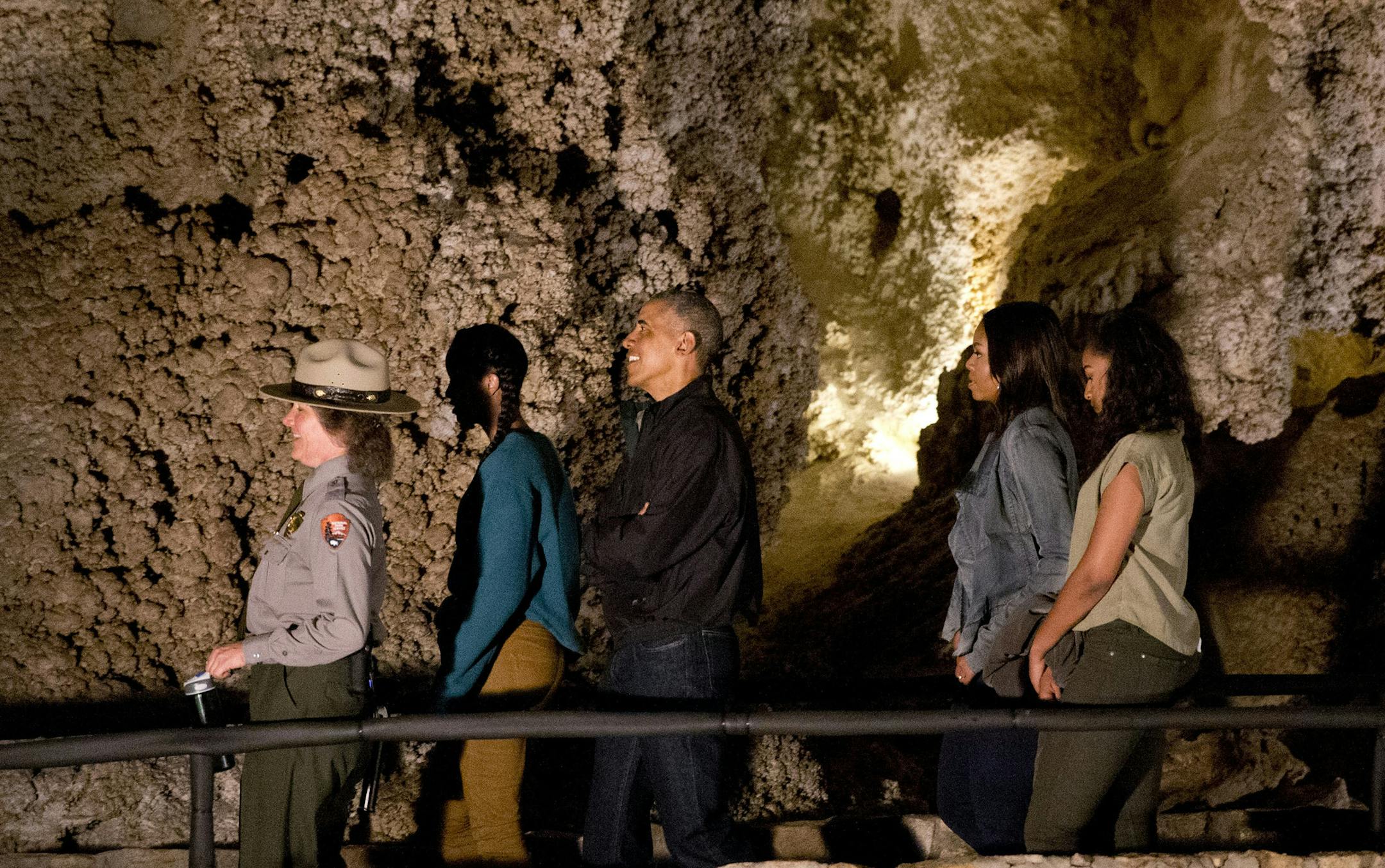 A member of the National Park Service, left, leads Malia Obama, President Barack Obama, first lady Michelle Obama, and Sasha Obama, on a tour of Carlsbad Caverns in Carlsbad Caverns National Park, in Carslbad, N.M., on Friday, June 17, 2016. The Obama family is traveling to Carlsbad Caverns National Park to celebrate the 100th anniversary of the creation of America's national park system. (AP Photo/Jacquelyn Martin)