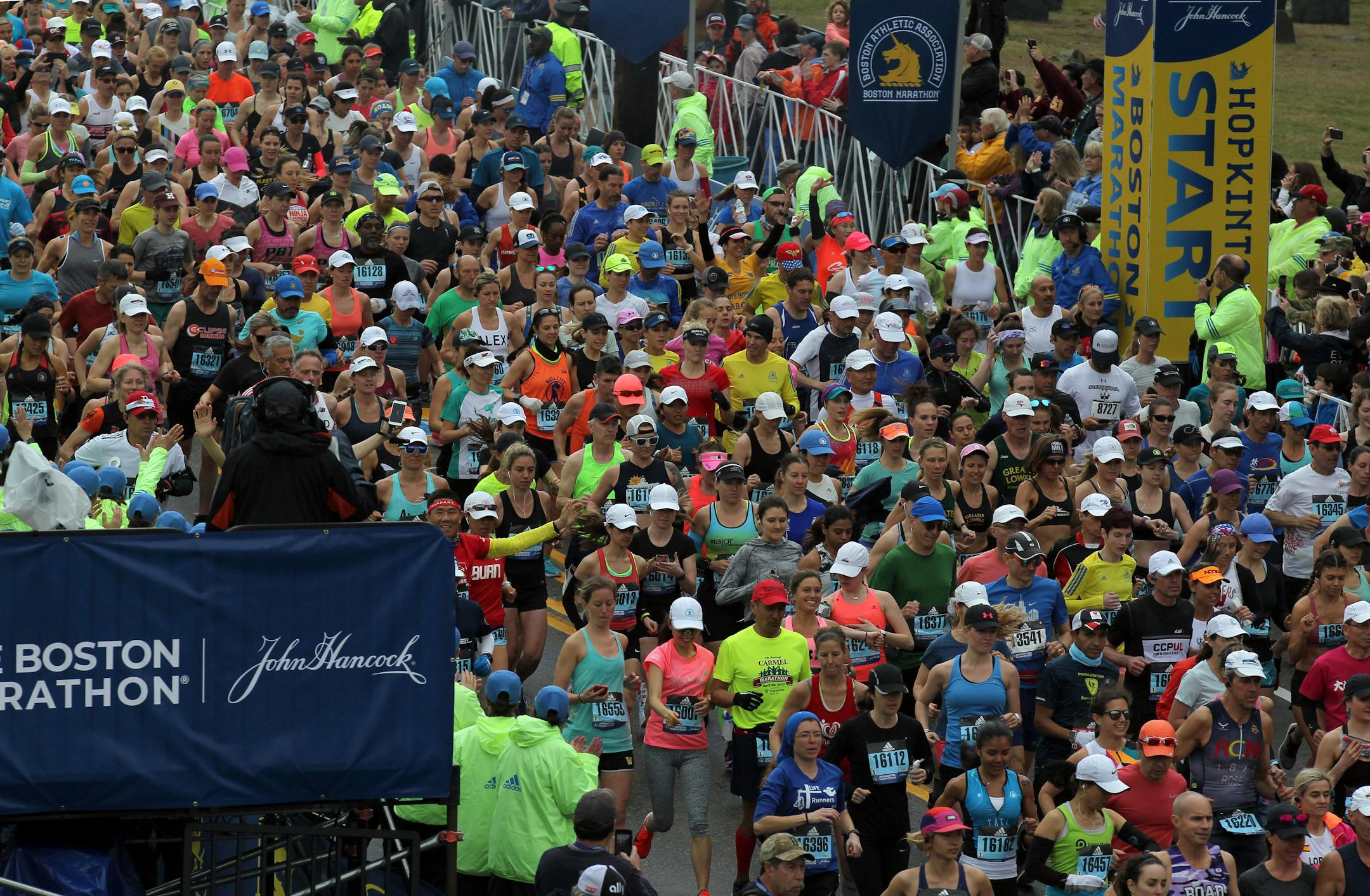 The third wave of runners starts the 123rd Boston Marathon on Monday, April 15, 2019, in Hopkinton, Mass. (AP Photo/Stew Milne)