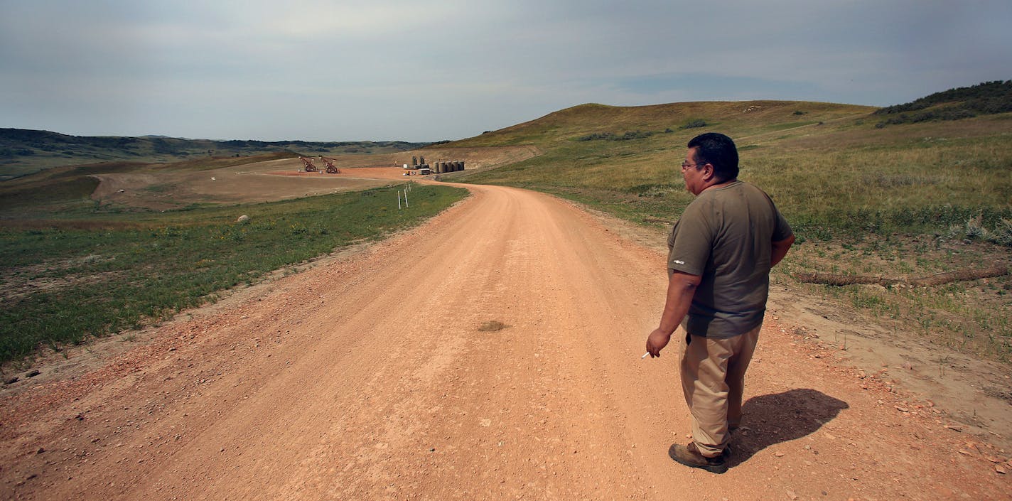 Corey Sanders, 44, lives along Indian Affairs Road 14, where heavy traffic from oil trucks has severely damaged the road, making it very difficult to navigate. Sanders ranches 67 acres with his brother, Randy and has 38 head of cattle. Nearby drilling has had impact on his cattle and their ability to graze the grasslands. ] (JIM GEHRZ/STAR TRIBUNE) / November 19, 2013, Mandaree/Fort Berthold Indian Reservation, ND &#x201a;&#xc4;&#xec; BACKGROUND INFORMATION- PHOTOS FOR USE IN FOURTH PART OF NORT