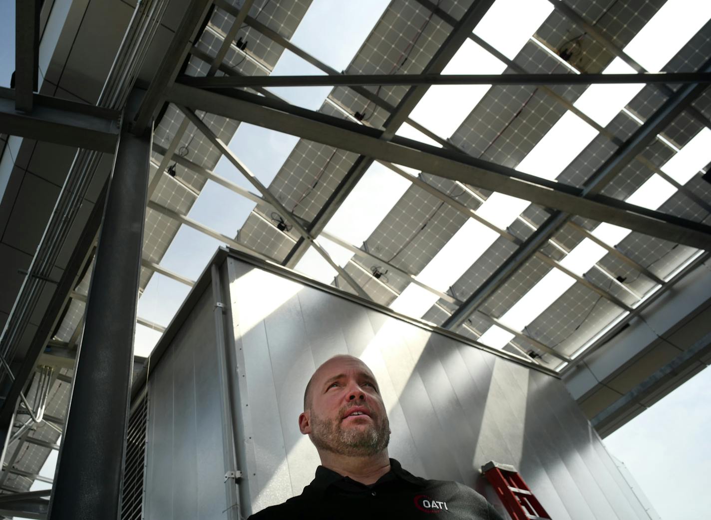 The rooftop has full array of solar panels.David Heim, Chief Strategy Officer, of OATI discussed the microgrid capabilities of the new building which uses solar, wind, and gas turbine to generate electricity.]RichardTsong-Taatarii richard.tsong-taatarii@startribune.com