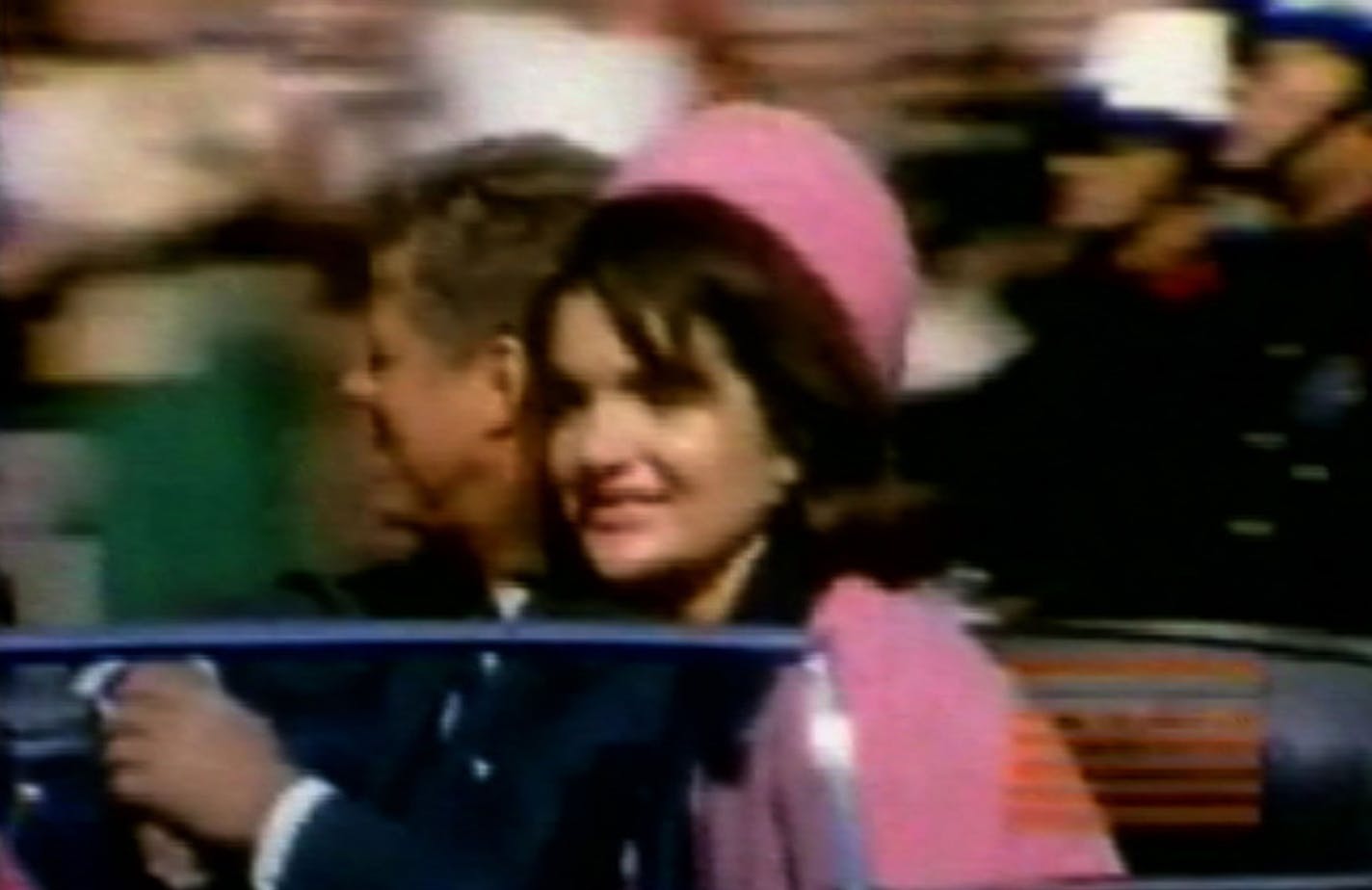 This image made from a home movie released Monday, Feb. 19, 2007 by the Sixth Floor Museum at Dealey Plaza shows former President John F. Kennedy, left, and his wife Jacqueline moments before his assassination in Dallas on Nov. 22, 1963.