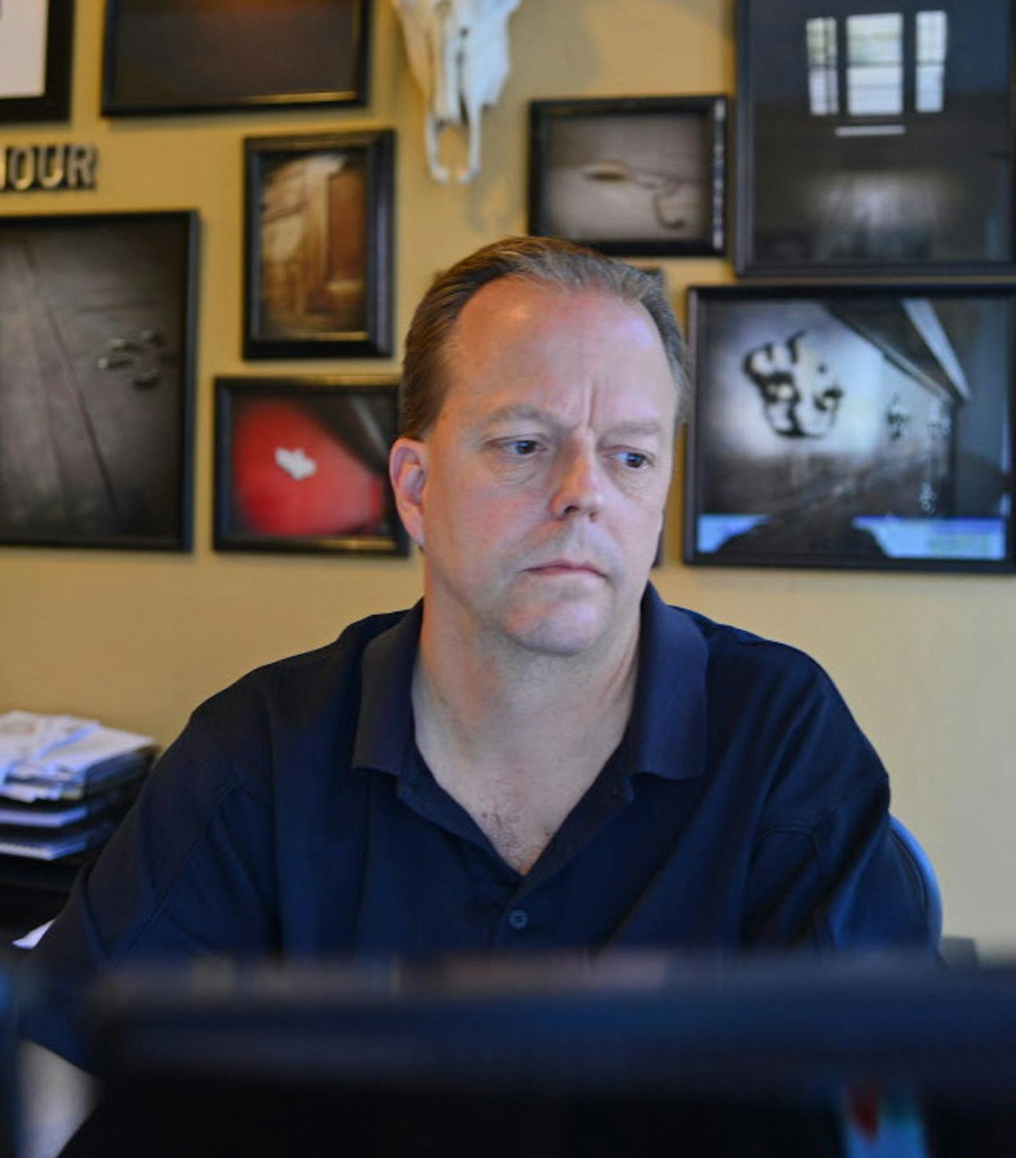 Steve Frenz is President of The Apartment Shop, and took over about 38 buildings from slumlord Spiros Zorbalas six months ago. He begins his day early, getting work orders ready for maintenance crews. ] Richard.Sennott@startribune.com Richard Sennott/Star Tribune. Minneapolis, Minnesota Wednesday 6/19/13) ** (cq)