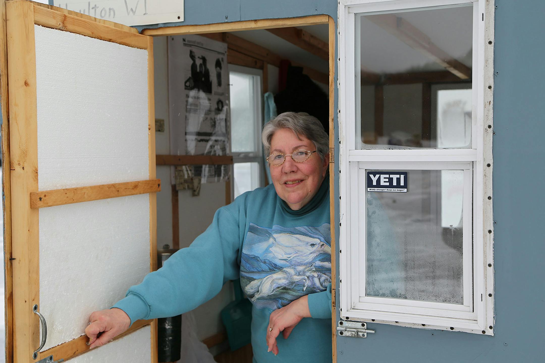 Judy Holmquist regularly fishes the St. Croix River in winter with her husband, Roy. But they usually occupy separate shacks while on the ice — two of the four fishing structures they keep on the river in close proximity to one another,.