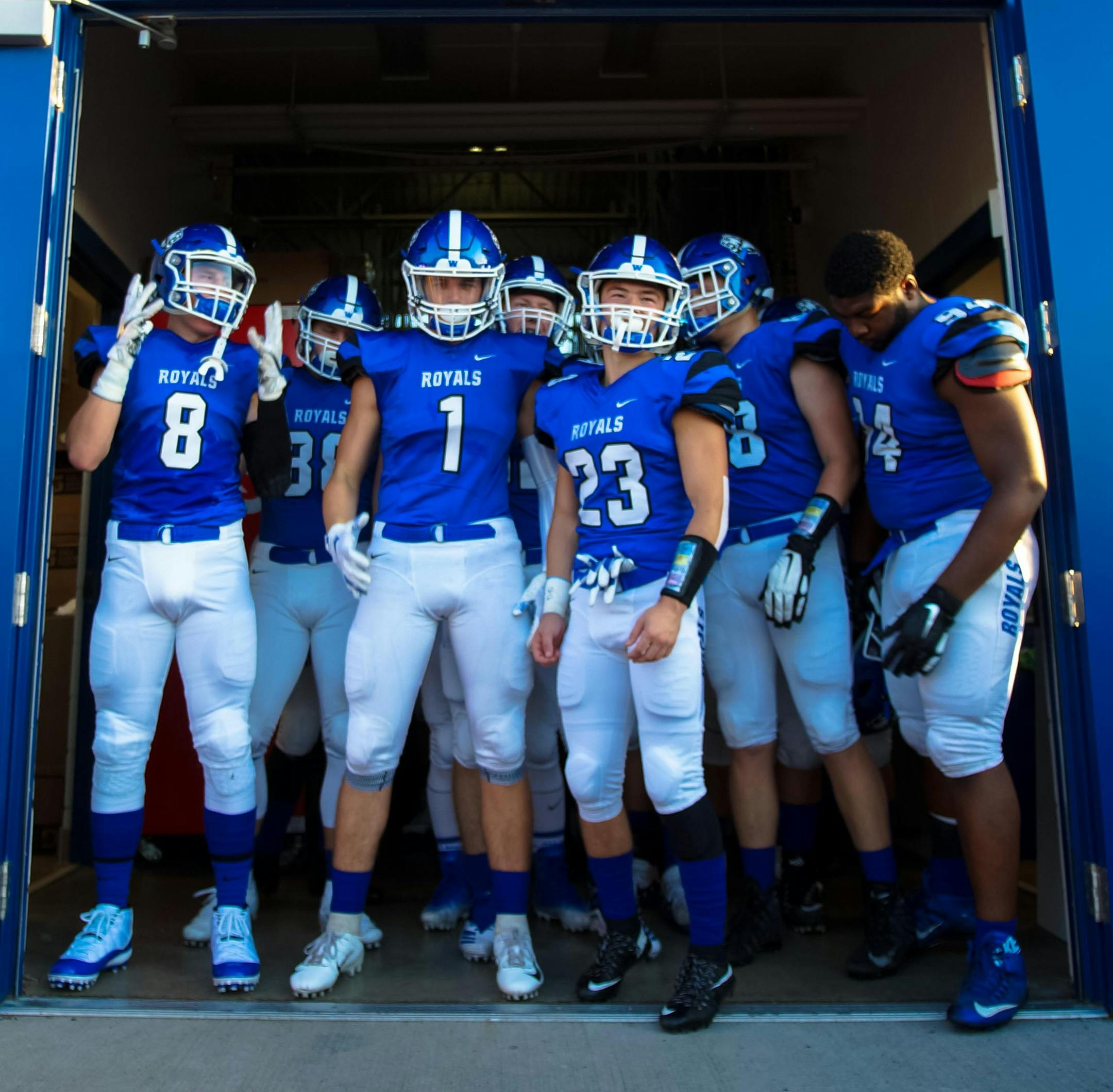 Woodbury players prepare to take the field before their home game against Roseville on Sept. 7, 2018, the second game of the regular season. Photo by Korey McDermott, SportsEngine